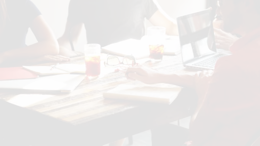 people discussing a project around a table