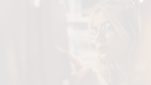 Woman looking at books in a library